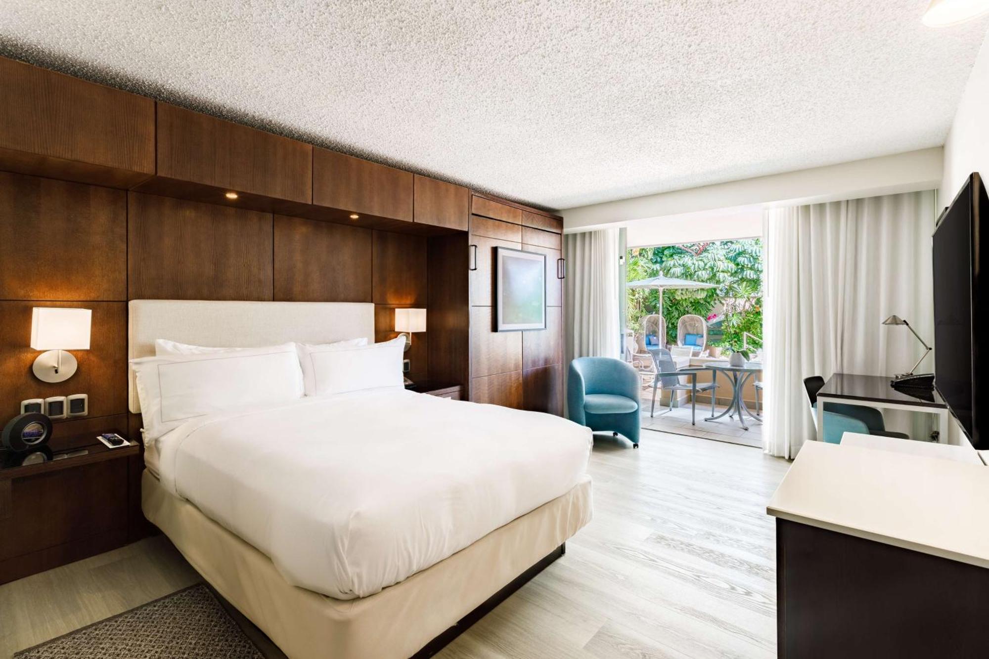 Queen Room with Extra Double Bed, Balcony and Garden View
